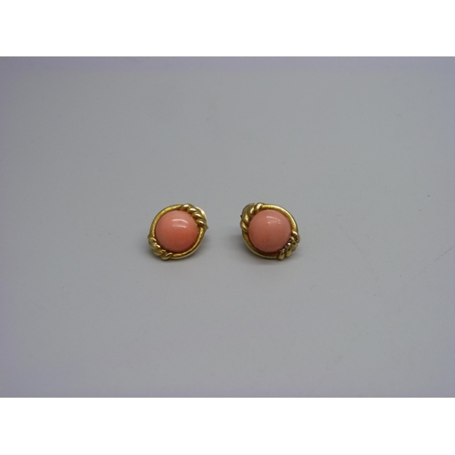 996A - A pair of 9ct gold and coral ear studs, 3.6g