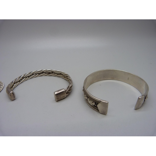 997 - Two silver bangles and a silver bracelet, 75g