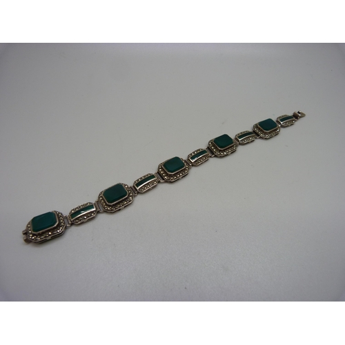 999 - A silver, marcasite and green stone bracelet