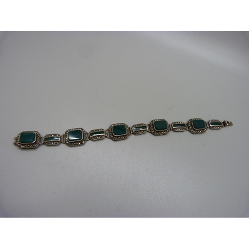 999 - A silver, marcasite and green stone bracelet