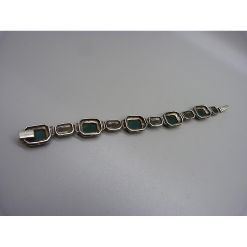 999 - A silver, marcasite and green stone bracelet