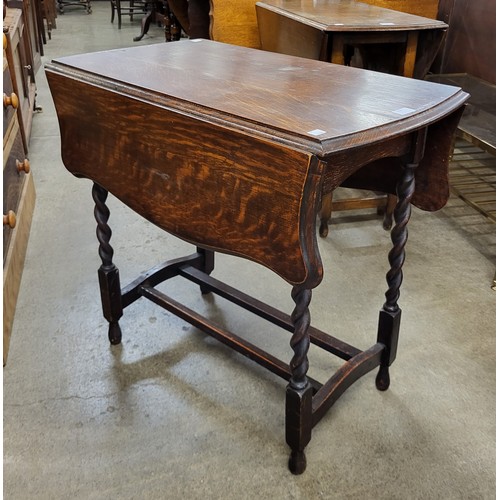 200 - An oak barleytwist gateleg table