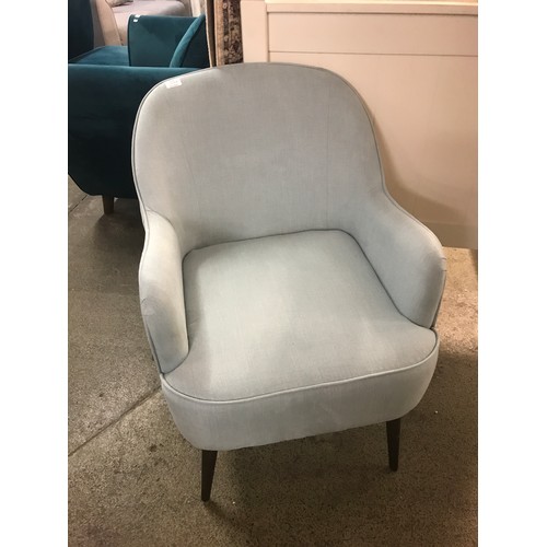 1525A - A light blue upholstered side chair with dark oak legs