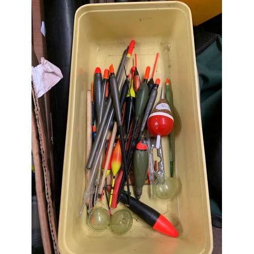 2047 - Qty. of mixed fishing rods, poles, cases, etc., and two plastic bait boxes with qty. of floats, hook... 