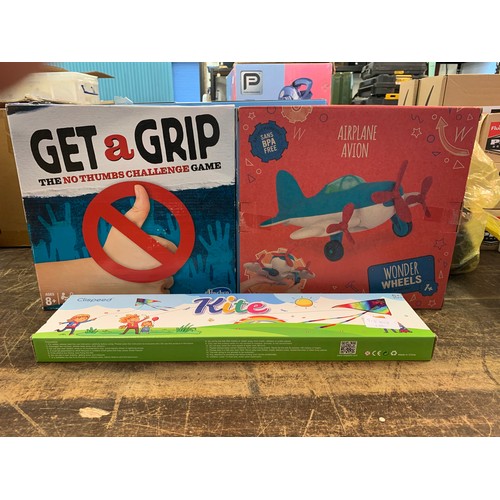 2035 - Get a Grip game, Clispeed kite and Wonderwheels child's aeroplane toy, all sealed and unused