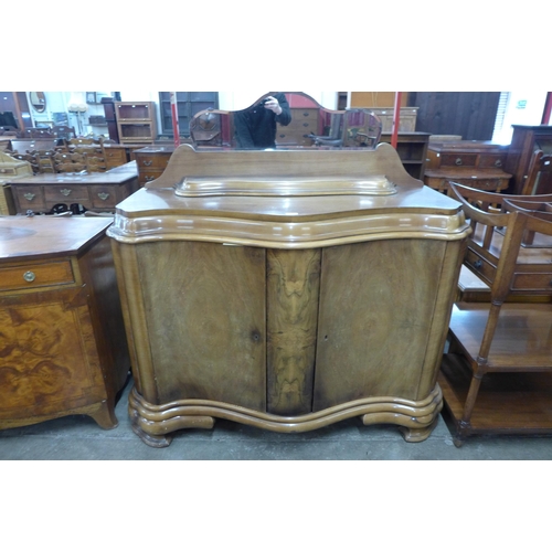 101 - An Art Deco walnut serpentine sideboard