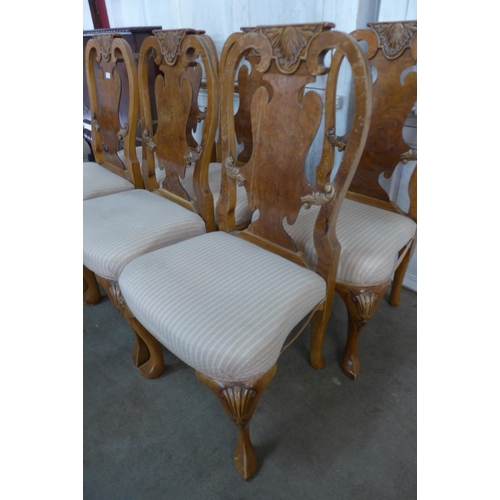 109 - A set of six Queen Anne style walnut dining chairs