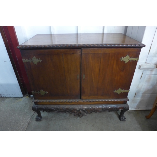 110A - An Edward VII mahogany press cupboard