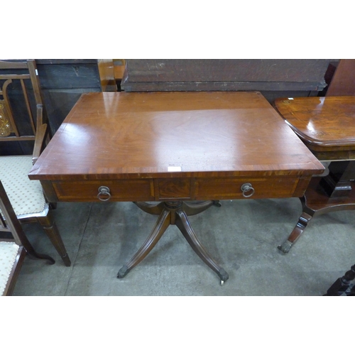 116 - A George IV mahogany two drawer library table