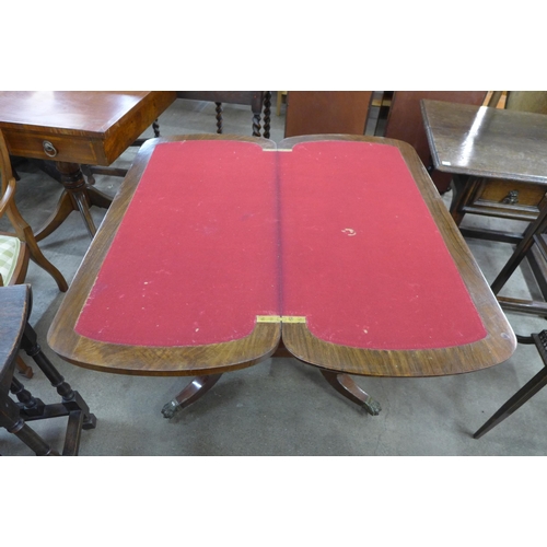 118 - A Victorian figured walnut and Tunbridgeware inlaid fold over games table, on associated base