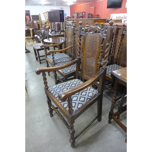 129 - A set of six oak barleytwist bergere dining chairs