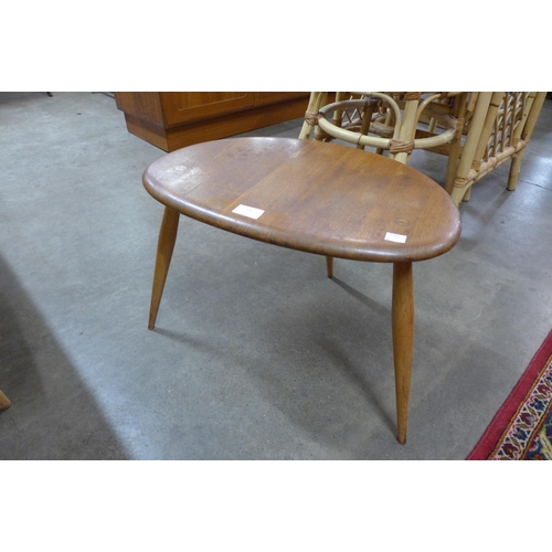 19 - An Ercol elm and beech pebble shaped coffee table