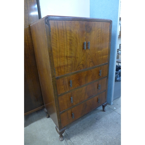 208 - A figured walnut three piece bedroom suite