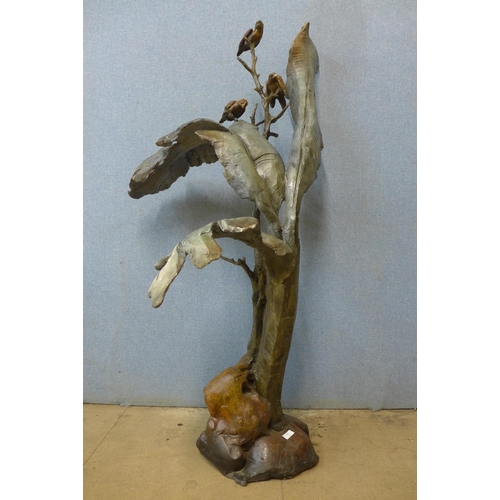 228 - A large bronze abstract sculpture of birds on a tree