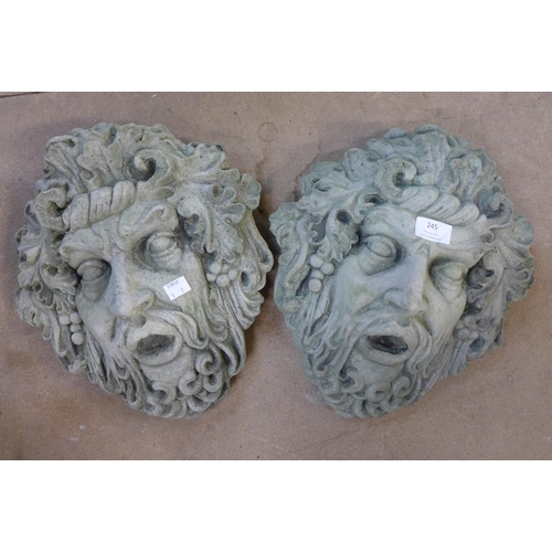 245 - A pair of concrete garden Medusa wall masks