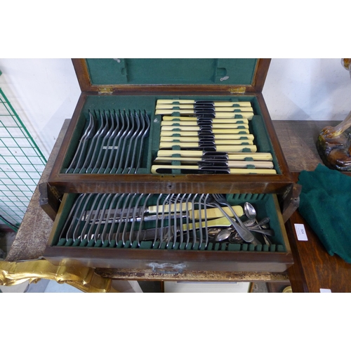 304 - Two oak cased canteens of plated cutlery (incomplete)