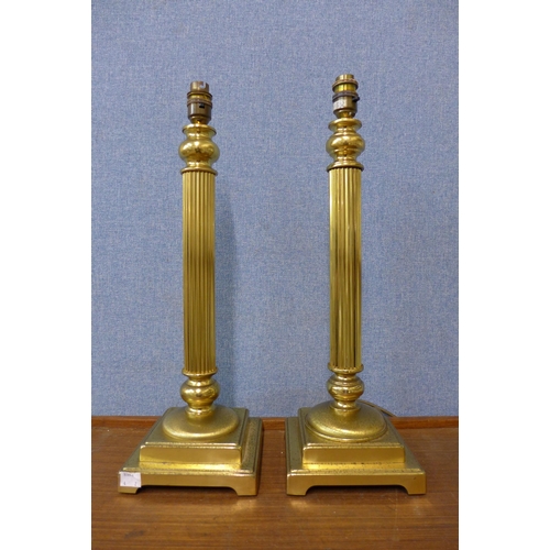 315 - A pair of brass reeded column table lamps