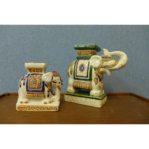 316 - Two small porcelain elephant jardiniere stands