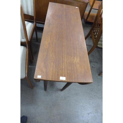 44 - A G-Plan teak drop-leaf table