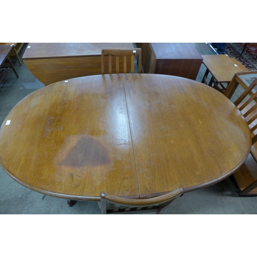 46 - A G-Plan Fresco teak extending dining table and four chairs