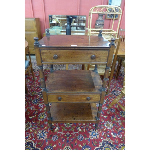 58 - A George IV mahogany three tier whatnot