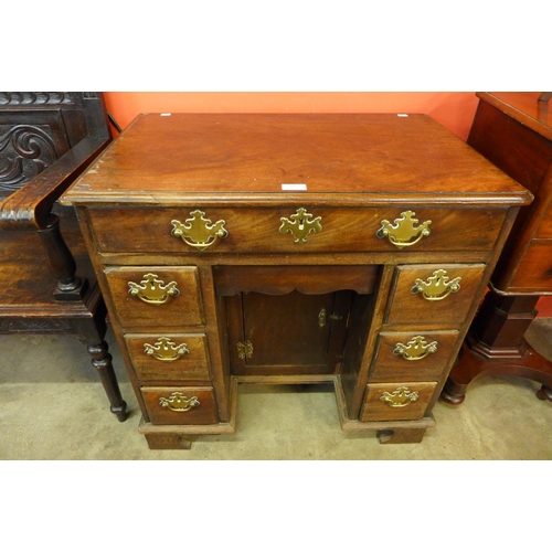 67 - A George II mahogany kneehole desk