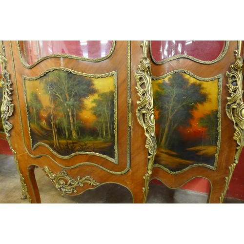 74 - A pair of large French Louis XV style walnut and gilt metal Vernis Martin serpentine vitrines