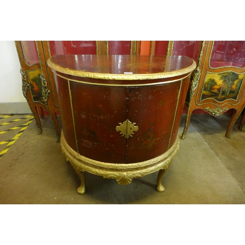 76 - A Chippendale Revival gilt and red Japanned demi lune side cabinet