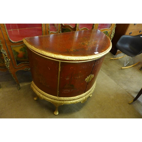 76 - A Chippendale Revival gilt and red Japanned demi lune side cabinet