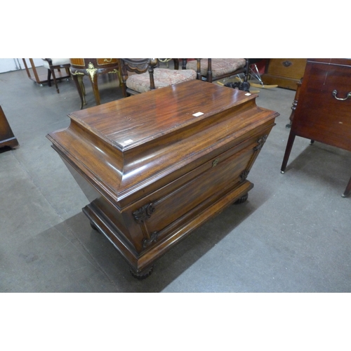 79 - A Regency mahogany sarcophagus shaped wine cooler