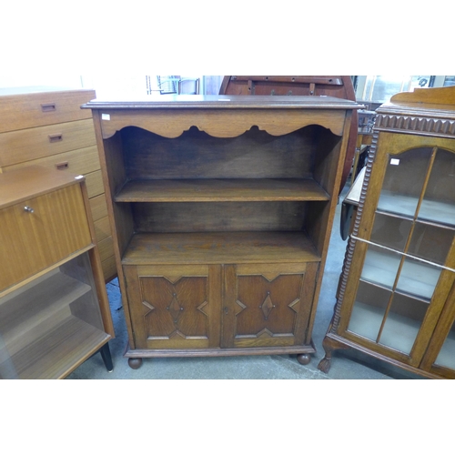 88 - An oak geometric moulded two door bookcase