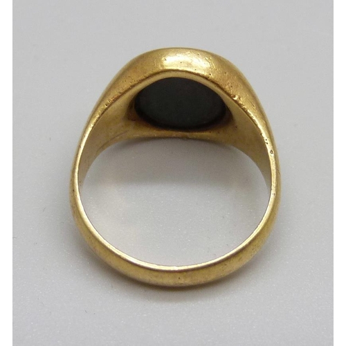 1018 - An 18ct gold bloodstone seal ring depicting a ram, 6.2g, K