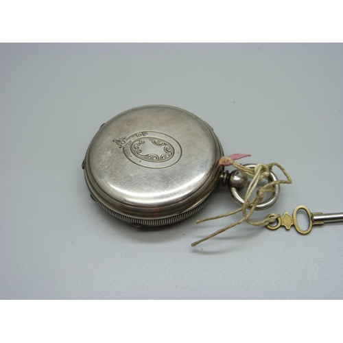 1034 - A silver pocket watch, centre seconds chronograph, Chester 1879