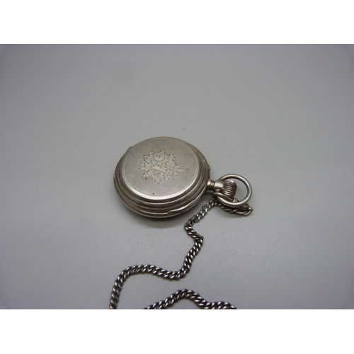 1048 - A white metal full hunter pocket watch, with inscription dated 1889, (tests as silver), on a chain