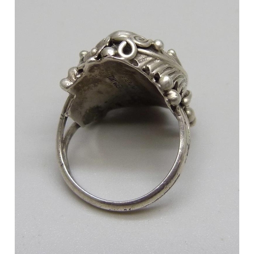 1125 - A silver Navaho ring by Tony Guerro, J