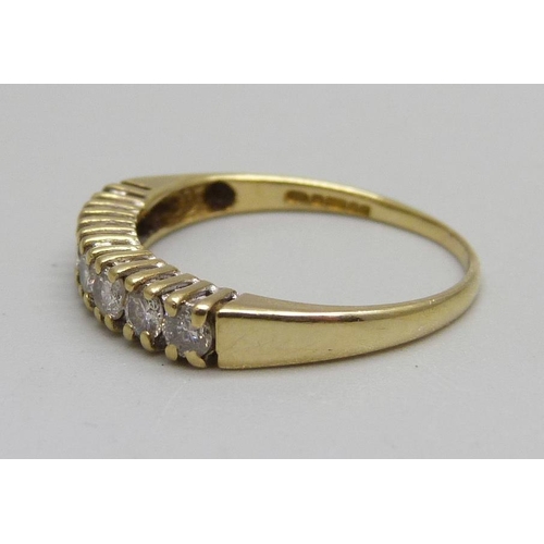 1130 - An 18ct gold, seven stone diamond ring, 2.1g, N