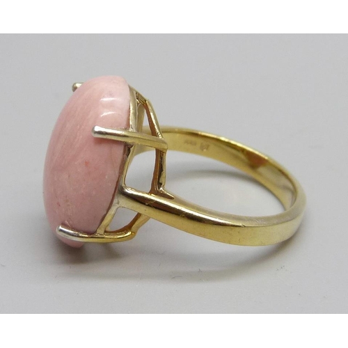 1138 - A silver gilt, Rhodochrosite cabochon ring, O