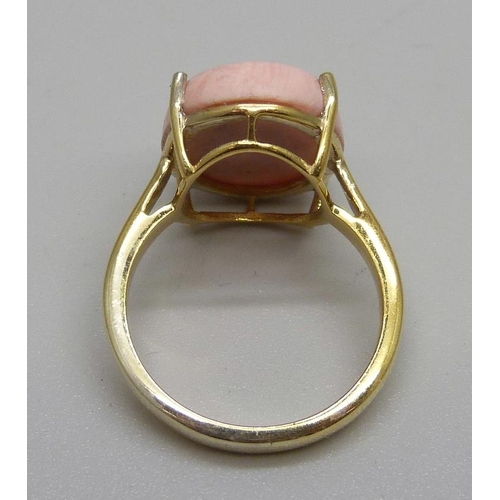 1138 - A silver gilt, Rhodochrosite cabochon ring, O