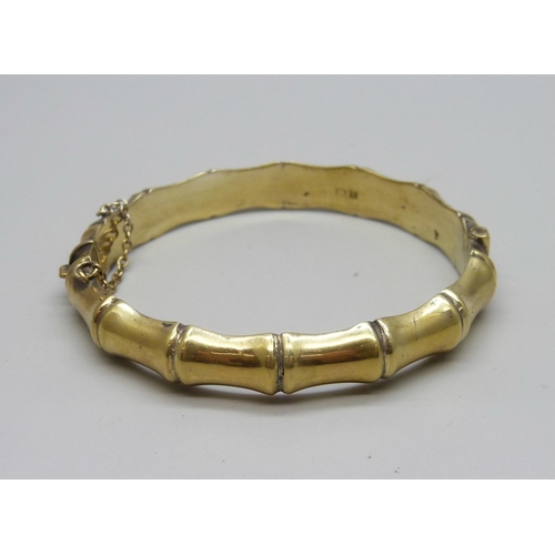 1141 - A silver gilt bamboo style bangle