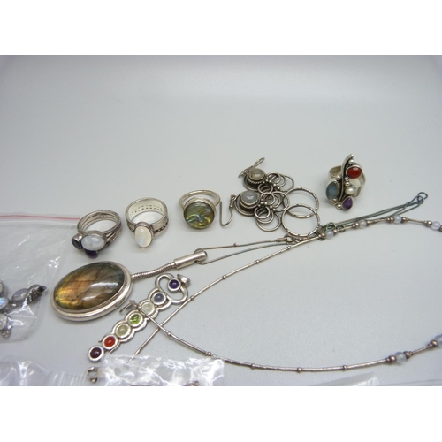 1153 - A collection of silver mounted gemstone jewellery