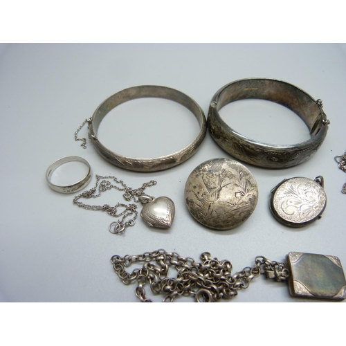 1158 - Two silver bangles, two lockets, etc.