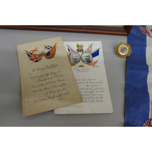 603 - A framed Prince of Wales silk, a 1902 Coronation handkerchief, two postcards and a brooch