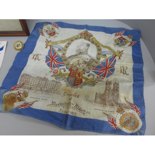 603 - A framed Prince of Wales silk, a 1902 Coronation handkerchief, two postcards and a brooch