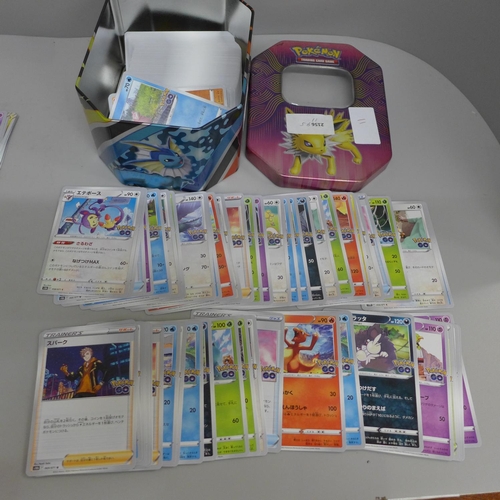 612 - Japanese Pokemon cards in a tin and a box