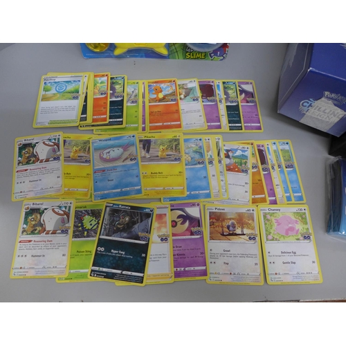 619 - 270 Pokemon Go cards including box, protective sleeves, card separators and a magazine