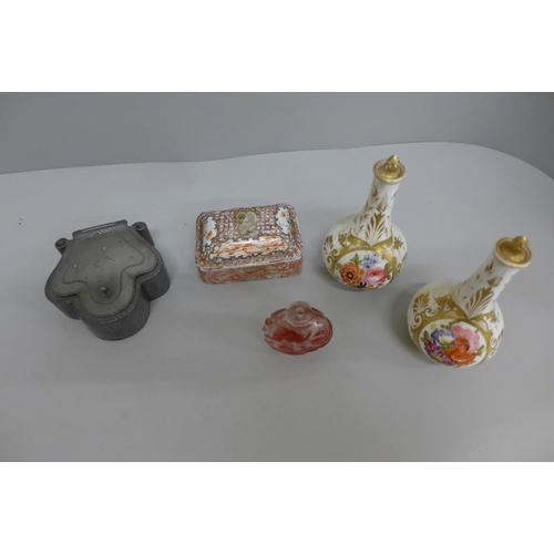 621 - A pewter inkwell, an oriental weight, a cranberry cut glass scent bottle and a pair of Crown Derby b... 