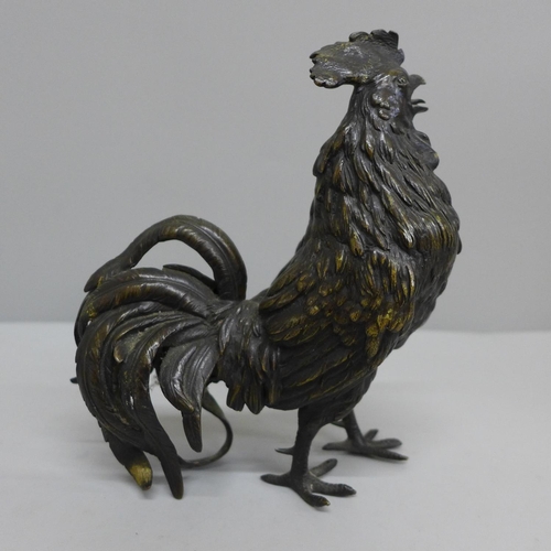 623 - A bronze model of a cockerel, 17cm