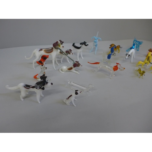 645 - A collection of small glass dog figures