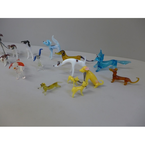 645 - A collection of small glass dog figures