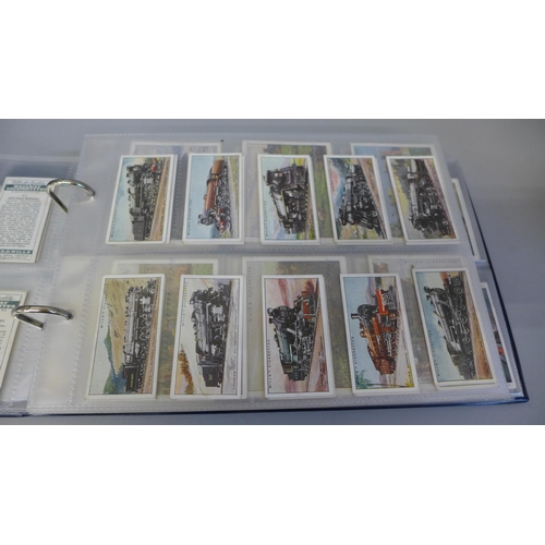 656 - Cigarette cards; an album of ten sets of Wills cards including Railway Locomotives, British Castles,... 